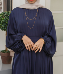 Elegant pleated abaya dress with bishop sleeves, ideal f abaya designs for formal events.