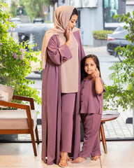 A beautiful layered modest co-ord outfit featuring a flowing overgarment and matching top from our online abaya shop.